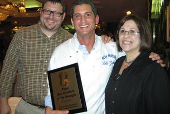 Chef Nick Mormando celebrates his win with Dish du Jour publisher Frances Grace and Josh Ozersky judge from The Feedbag.